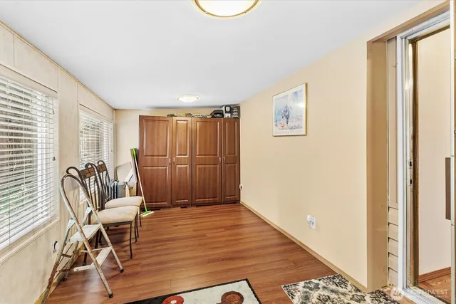 a view of a livingroom with furniture and a table