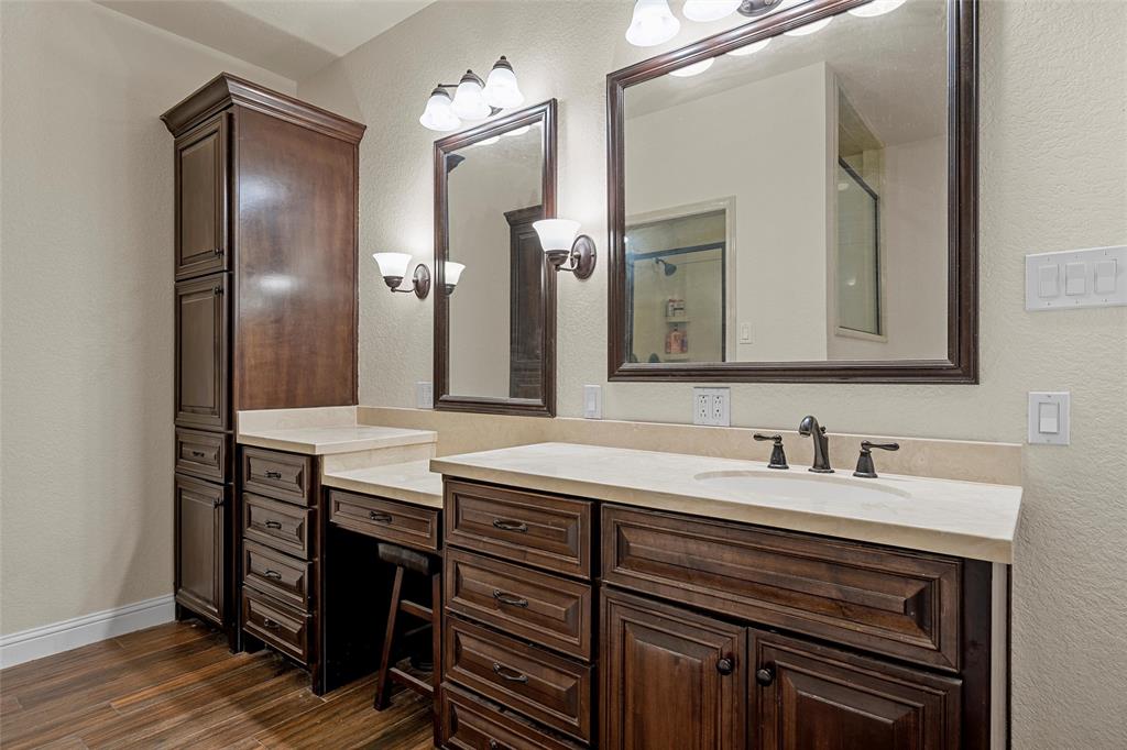 2743 Tokio Road West, TX 76691 - Photo 17 of 40 a bathroom with a double vanity sink and a mirror