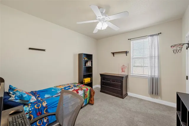 a bedroom with a bed and furniture