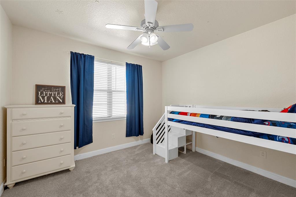 2743 Tokio Road West, TX 76691 - Photo 22 of 40 a room with furniture and ceiling fan