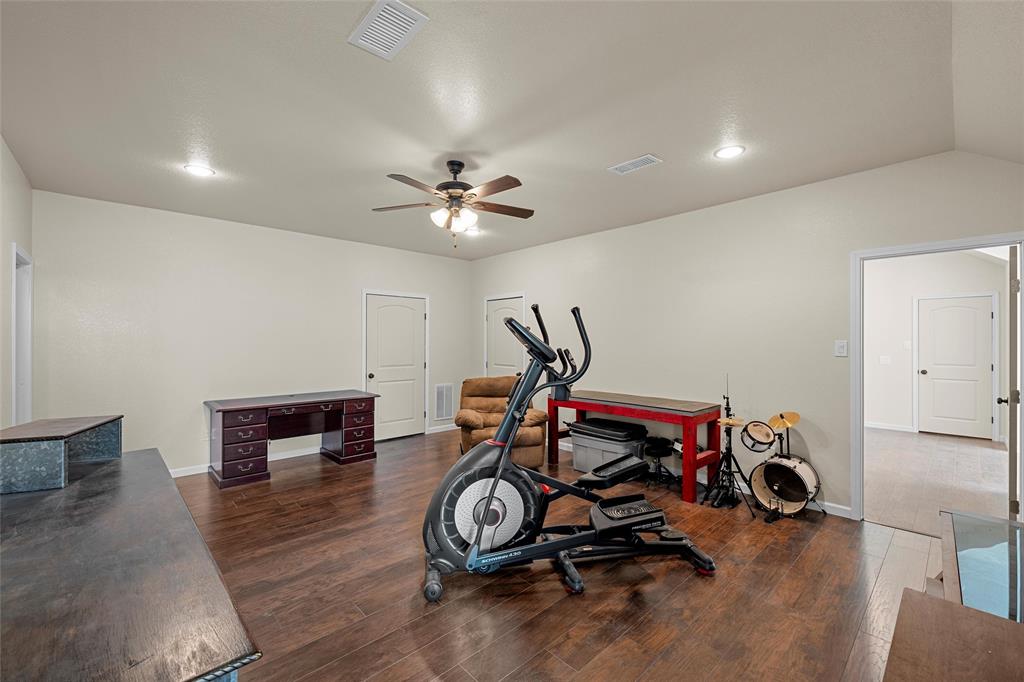 2743 Tokio Road West, TX 76691 - Photo 27 of 40 a view of a room with gym equipment