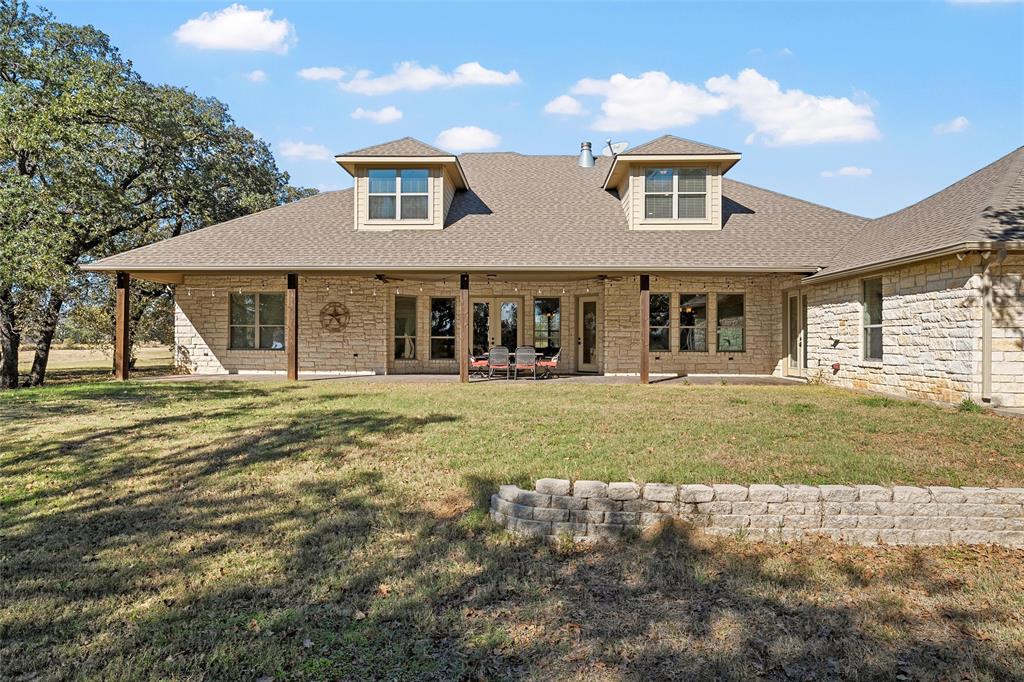 2743 Tokio Road West, TX 76691 - Photo 30 of 40 a front view of a house with a yard