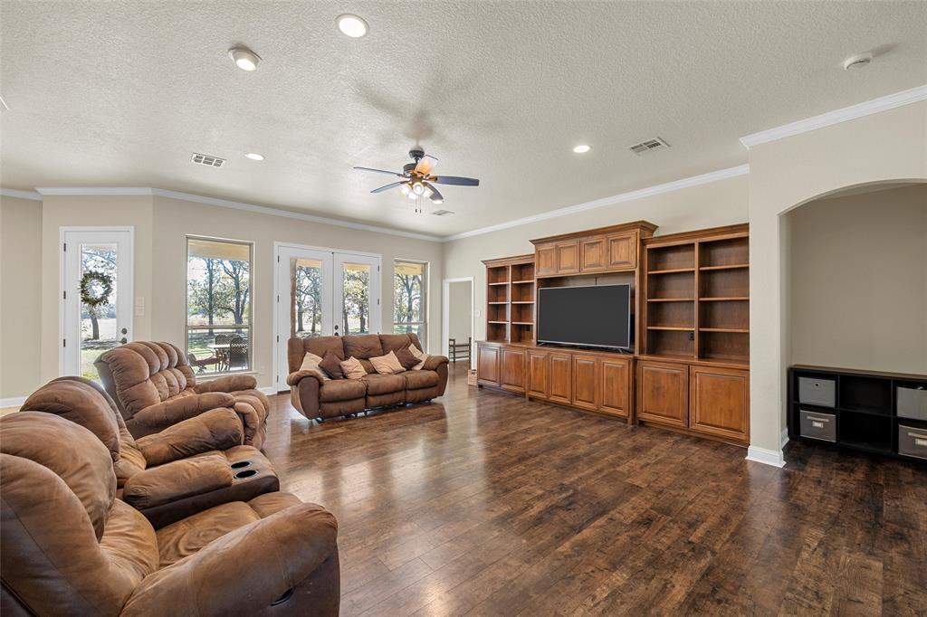 2743 Tokio Road West, TX 76691 - Photo 7 of 40 a living room with furniture and a flat screen tv