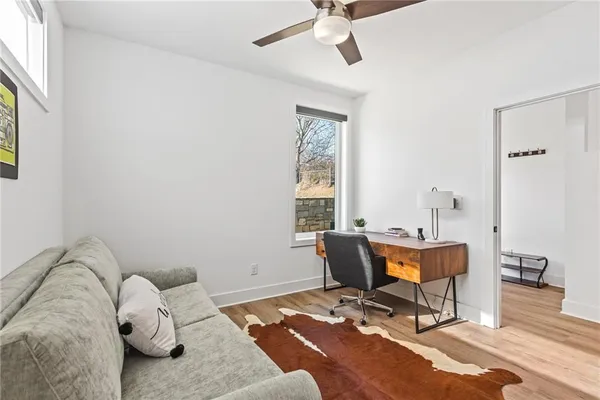a workspace with furniture and window