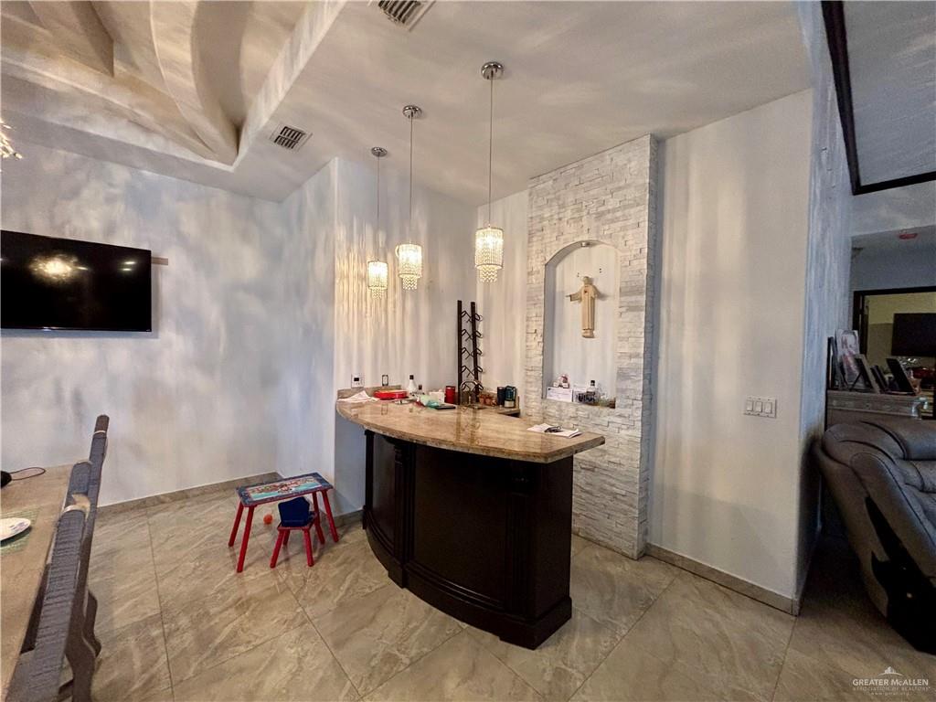 404 South Resplandor Street Mission, TX 78572 - Photo 6 of 19 a view of a living room and bathroom