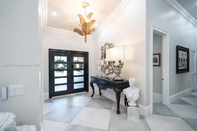 a view of a livingroom with furniture and a window