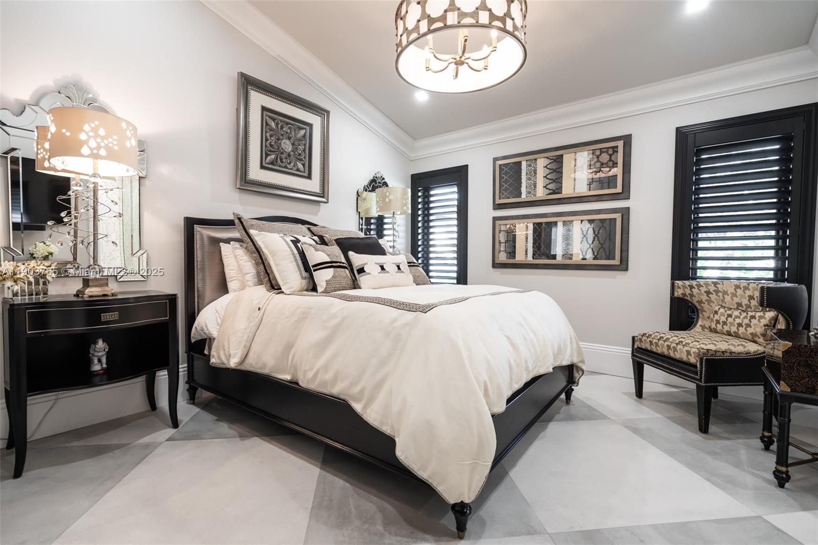 61 Northwest 128th Avenue Plantation, FL 33325 - Photo 3 of 24 a bed room with a bed and a chair