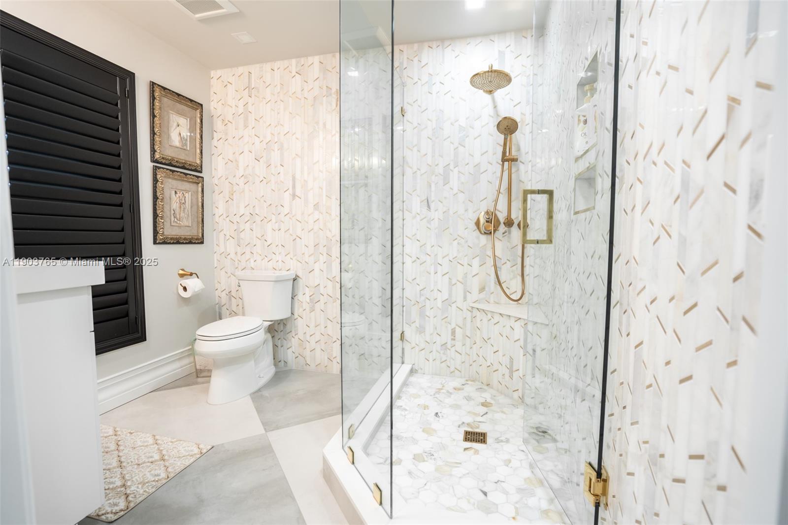 61 Northwest 128th Avenue Plantation, FL 33325 - Photo 4 of 24 a bathroom with a toilet and a shower