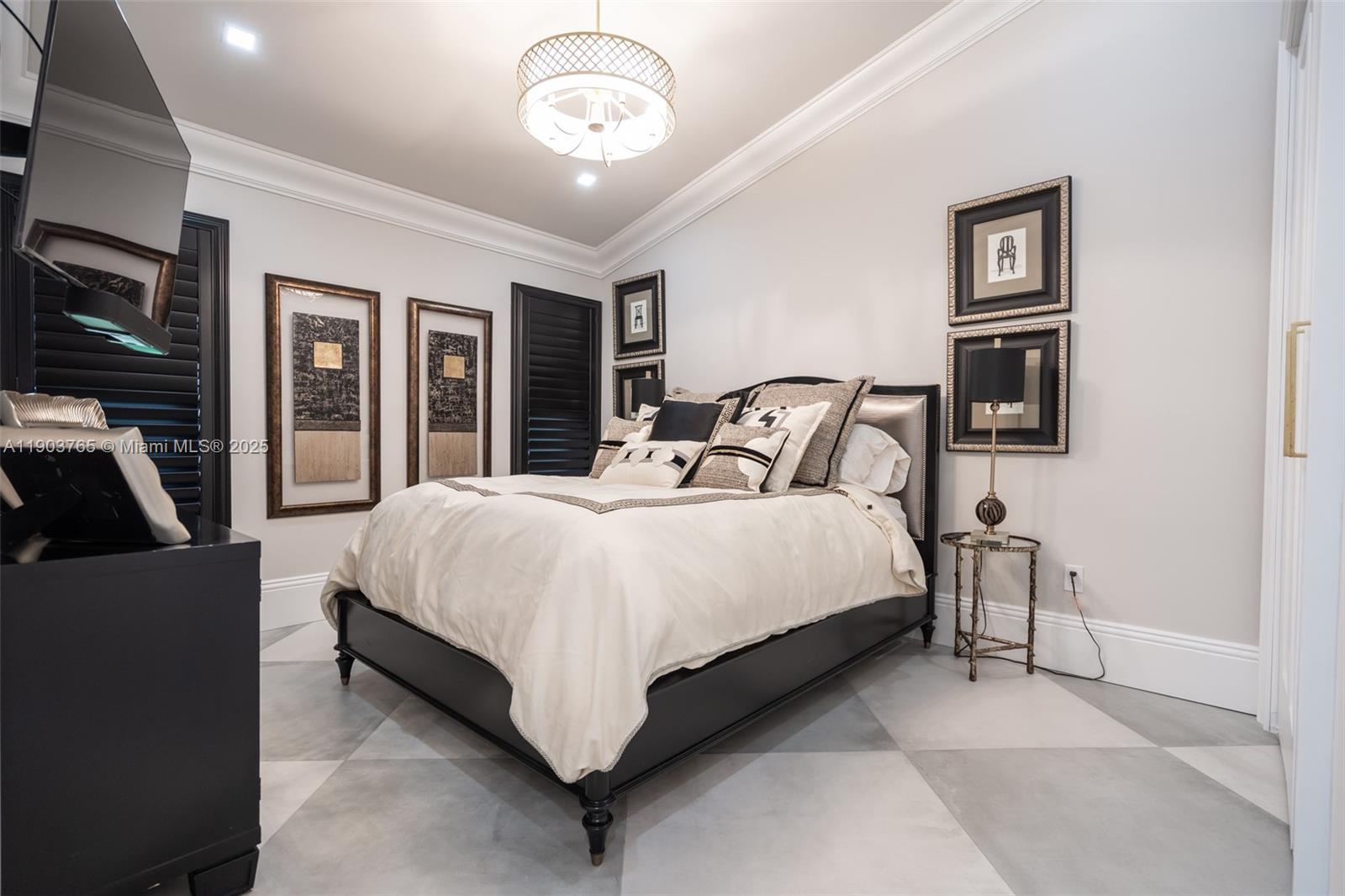 61 Northwest 128th Avenue Plantation, FL 33325 - Photo 5 of 24 a bedroom with a large bed and tv