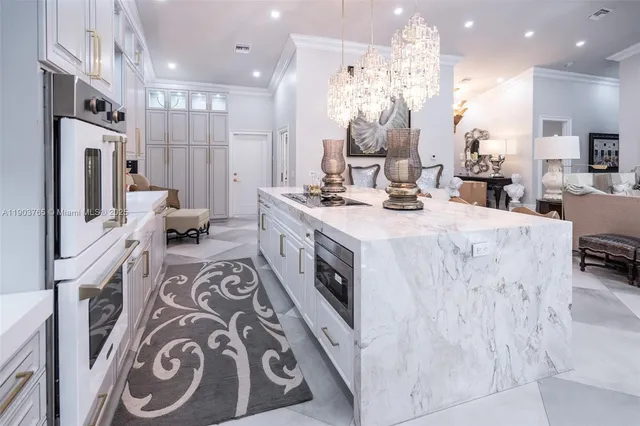 a spacious bathroom with a sink a large mirror and a shower