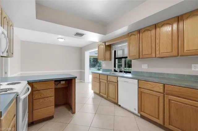 $780,000 | 711 21st Street Southwest, Naples, FL 34117