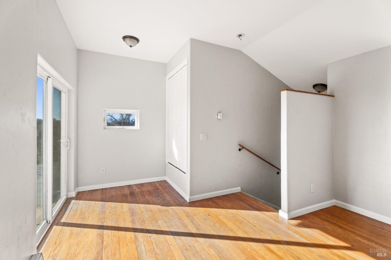 2901-2903 Rd I, Unit AC Redwood Valley, CA 95470 - Photo 15 of 32 Hardwood floors in primary bedroom.