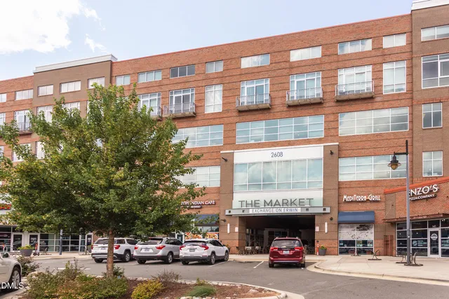a car parked in front of a building
