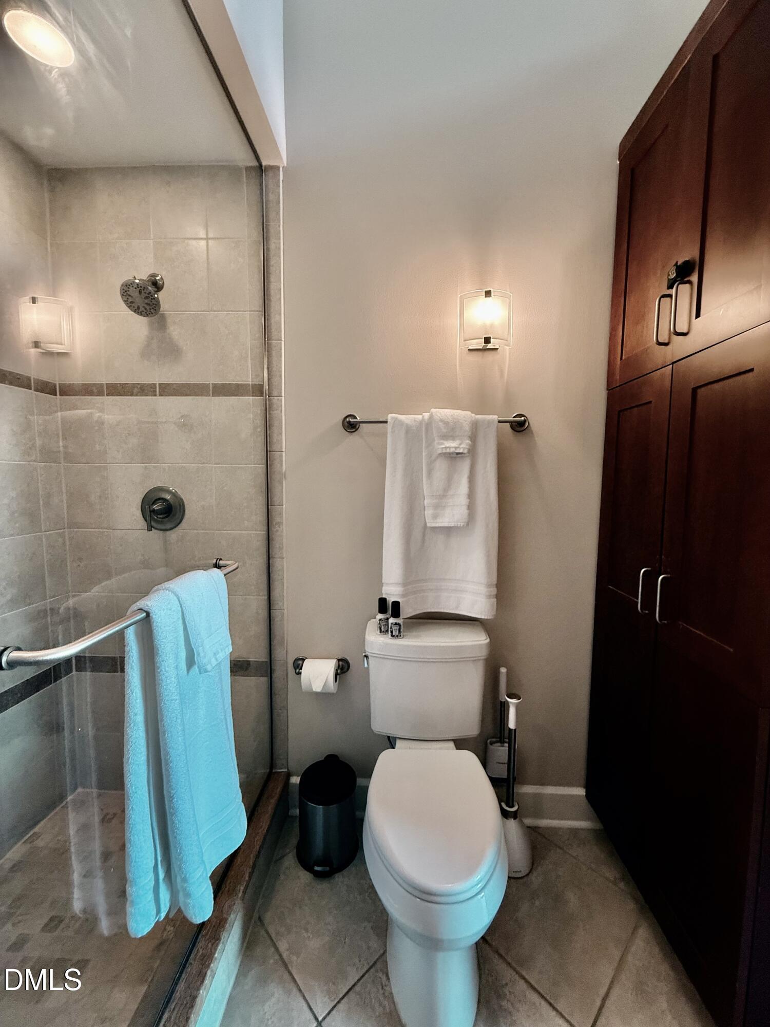 2608 Erwin Road, Unit 421 Durham, NC 27705 - Photo 28 of 45 a bathroom with a toilet and a shower