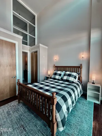 a view of a room with a black and white checkered floor