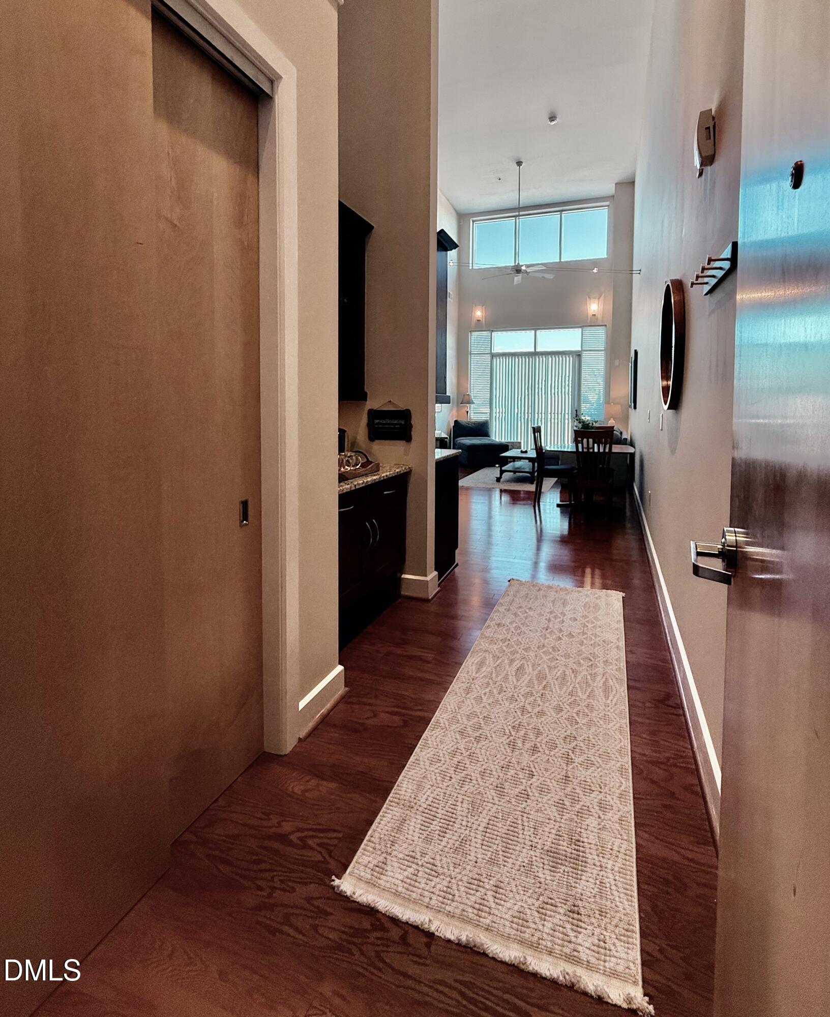 2608 Erwin Road, Unit 421 Durham, NC 27705 - Photo 4 of 45 a kitchen with wooden floor and refrigerator
