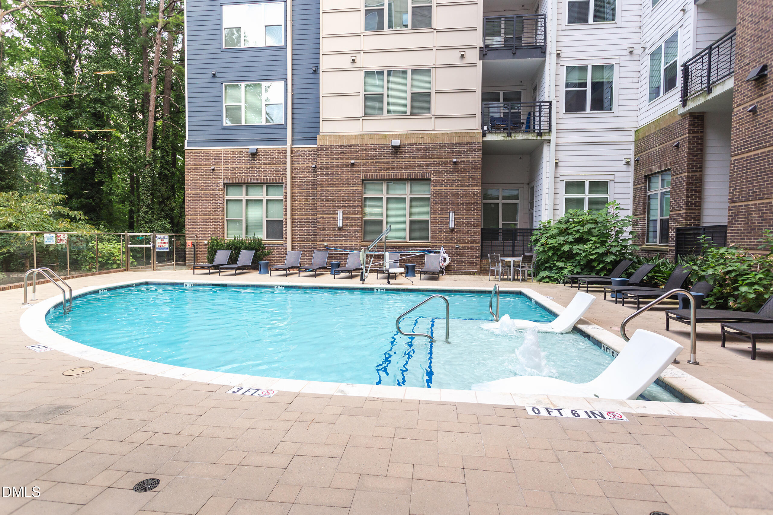 2608 Erwin Road, Unit 421 Durham, NC 27705 - Photo 41 of 45 a view of a swimming pool with outdoor seating