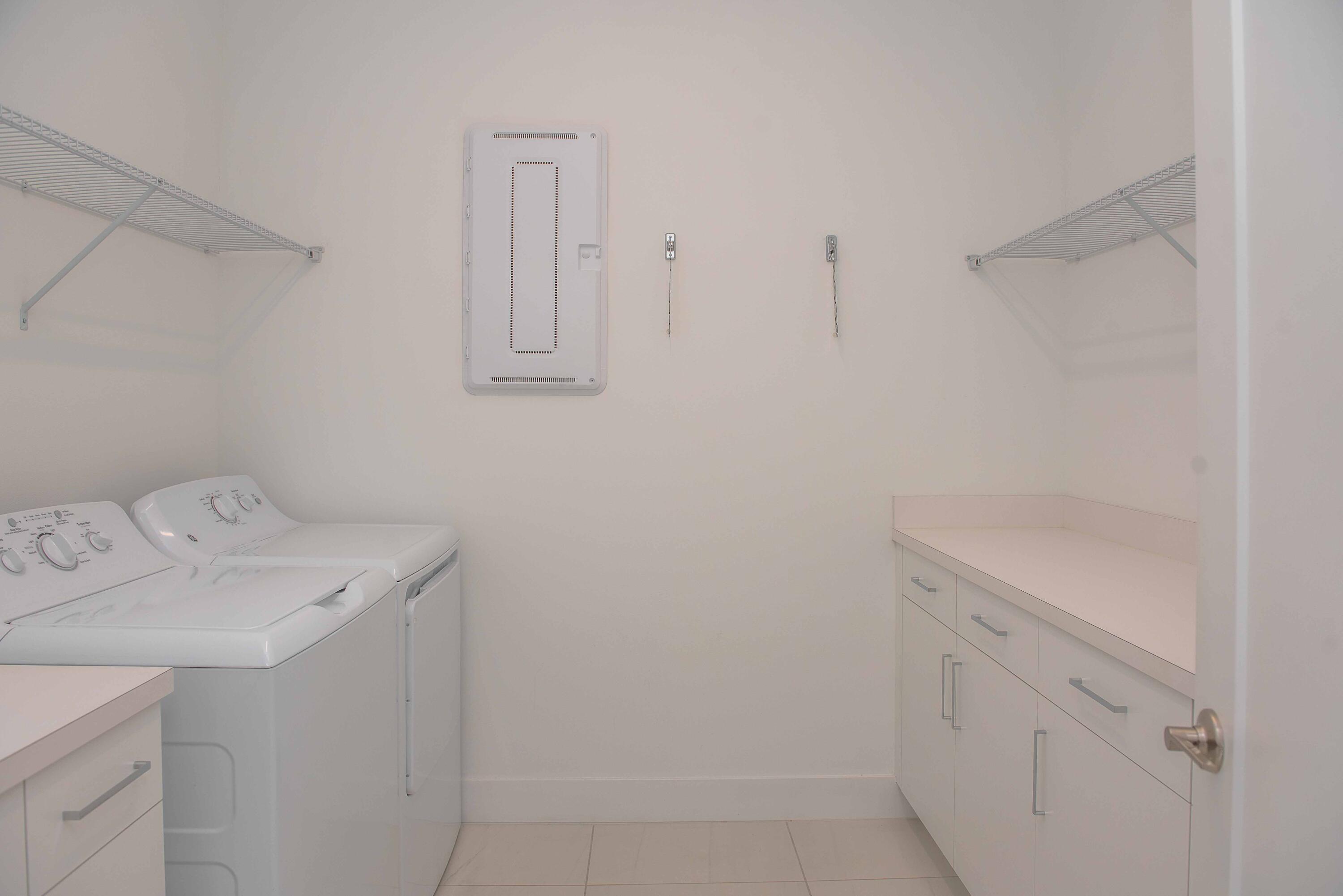 17035 Wandering Wave Avenue Boca Raton, FL 33496 - Photo 8 of 28 LAUNDRY ROOM