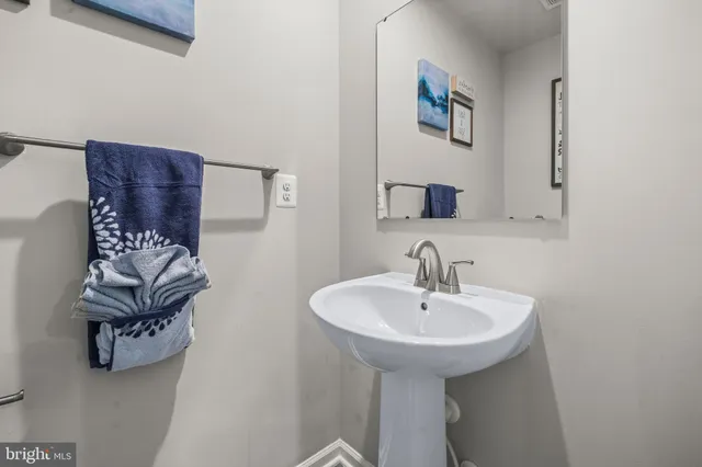 a bedroom with furniture and a book shelf