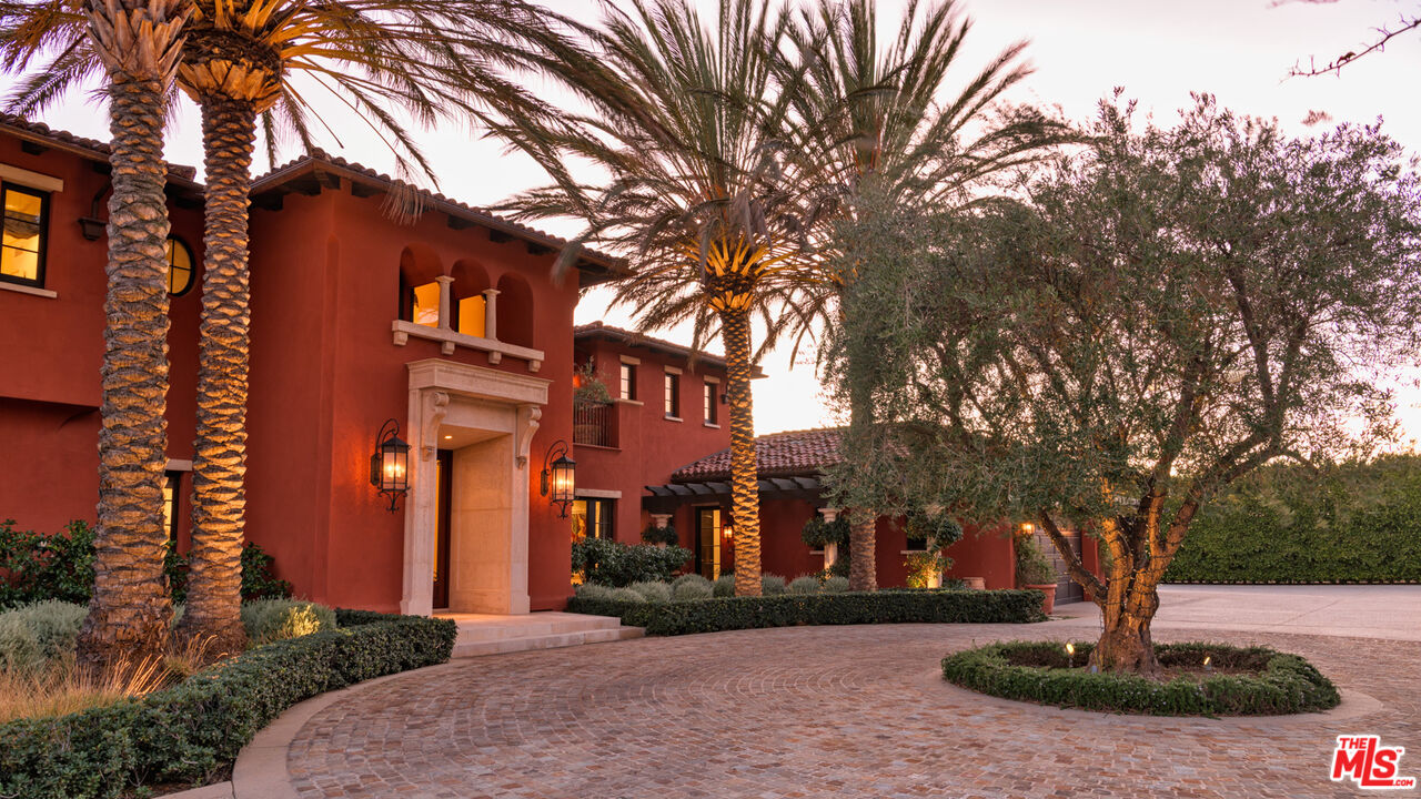 6093 Murphy Way Malibu, CA 90265 - Photo 43 of 52 a front view of a house with garden
