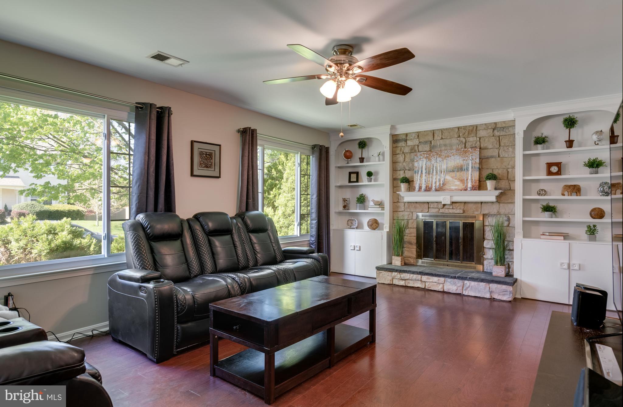 333 Silver Ridge Drive Sterling, VA 20164 - Photo 18 of 51 Sunken Family Room w/ Stone Fireplace & HWFs