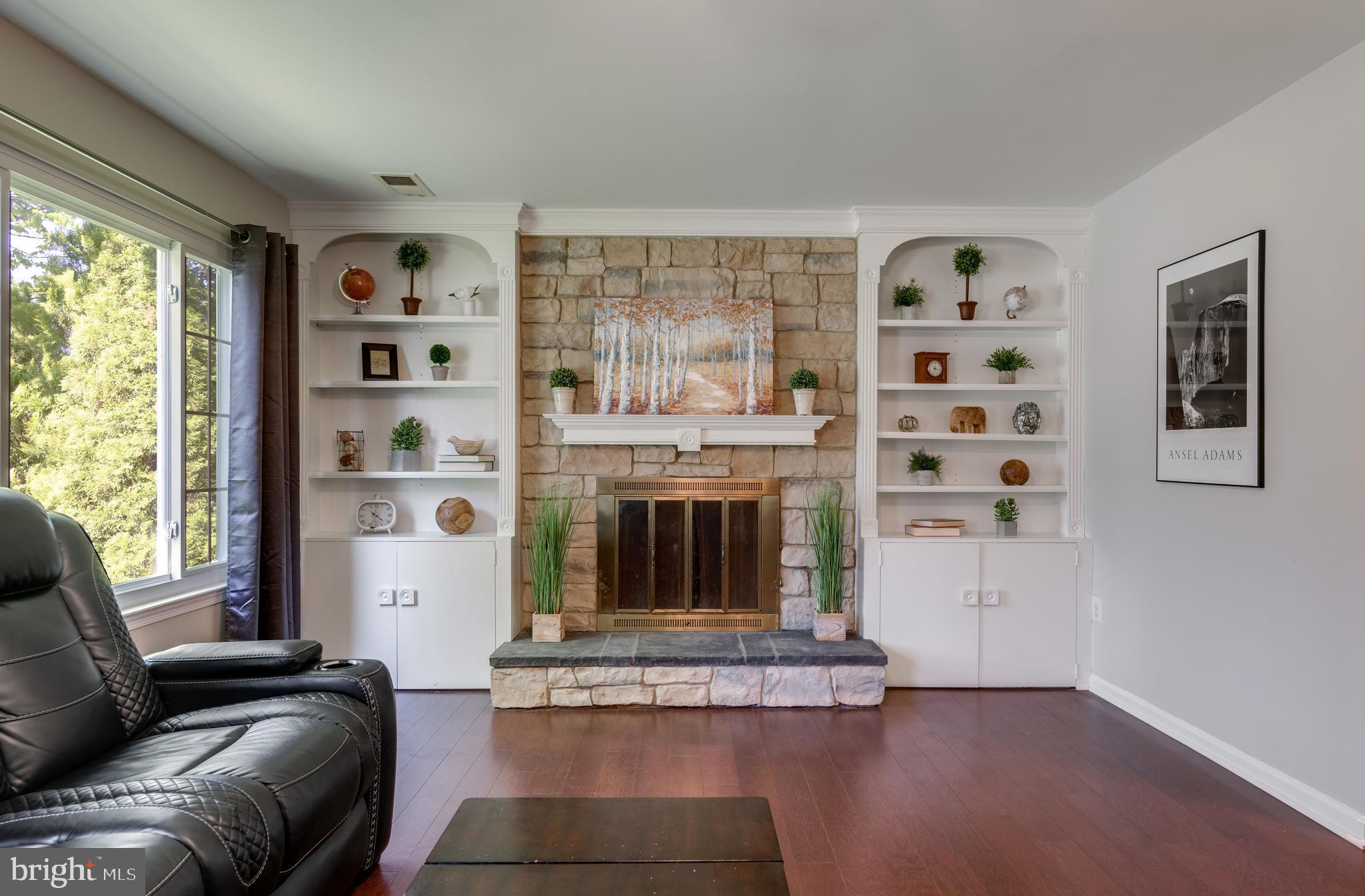 333 Silver Ridge Drive Sterling, VA 20164 - Photo 19 of 51 Built In Shelves Flank the Stone WB Fireplace