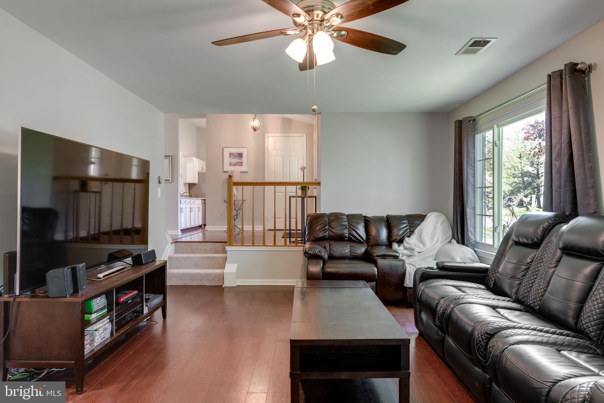 333 Silver Ridge Drive Sterling, VA 20164 - Photo 20 of 51 Family Room w/ HWFs, New Paint & 2 Huge Windows