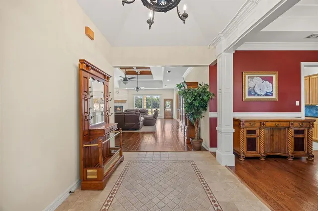 a view of a livingroom with furniture and staircase