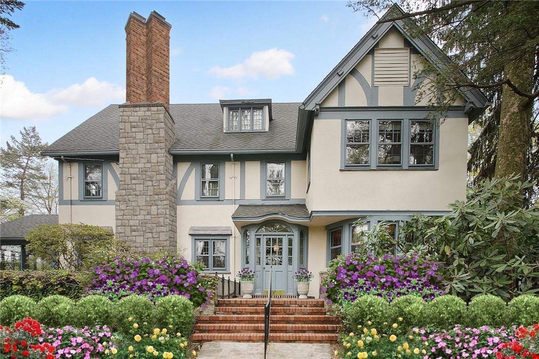 46 Durham Road Bronxville, NY 10708 - Photo 1 of 1 a front view of a house with a garden