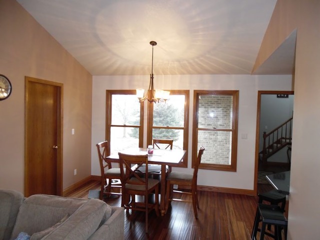 10215 East Hickory Ridge Drive Rochelle, IL 61068 - Photo 4 of 16 a view of a dining room with furniture window and outside view