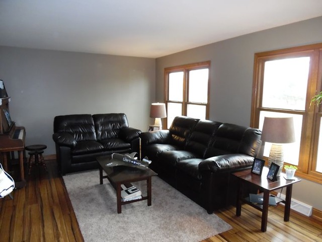 10215 East Hickory Ridge Drive Rochelle, IL 61068 - Photo 6 of 16 a living room with furniture and a window