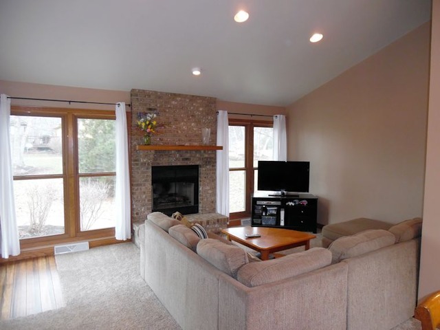 10215 East Hickory Ridge Drive Rochelle, IL 61068 - Photo 7 of 16 a living room with furniture and a flat screen tv