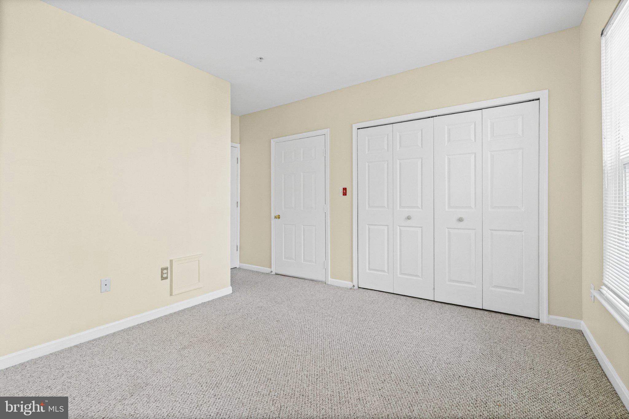 36 Hawk Rise Lane, Unit 104 Owings Mills, MD 21117 - Photo 17 of 25 Spacious room with neutral tones.
