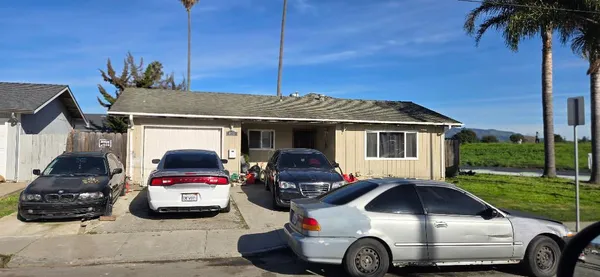 a car parked in front of a house