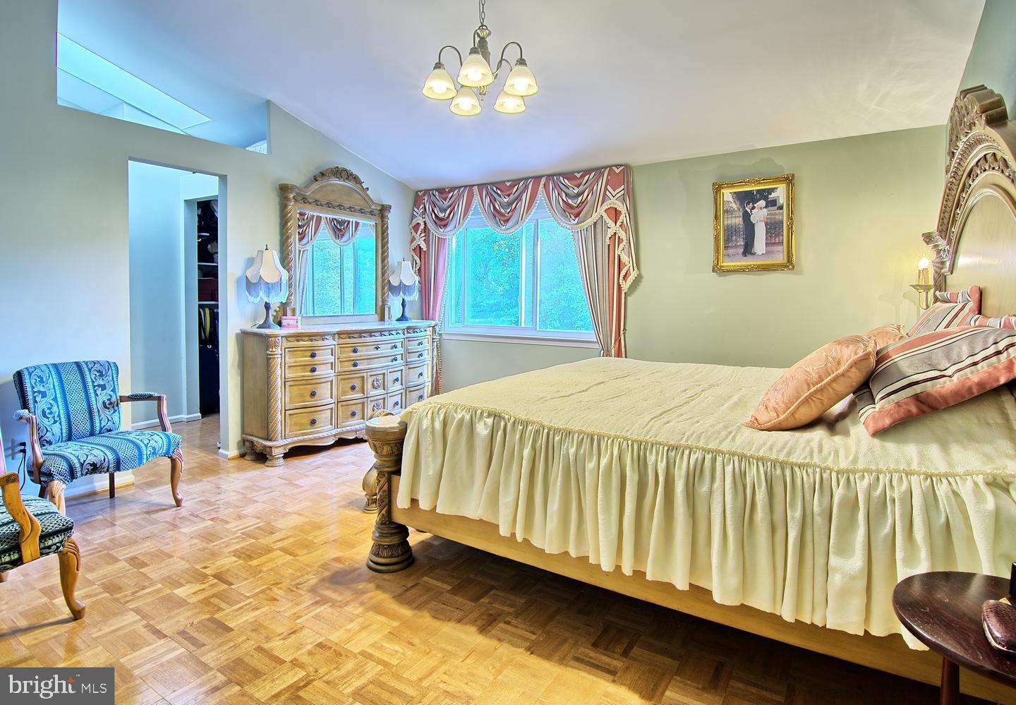 55 Jones Valley Circle Baltimore, MD 21209 - Photo 9 of 22 Master Bedroom with Parquet Floor and Skylight