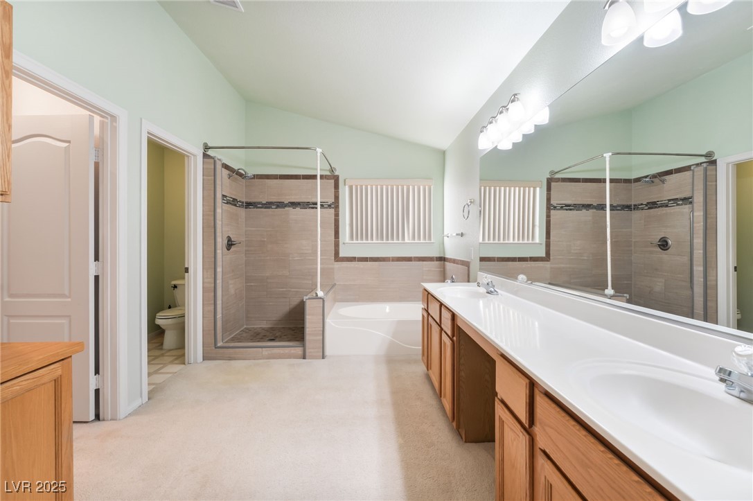 1341 Lime Point Street Las Vegas, NV 89110 - Photo 16 of 29 Primary Bathroom with Dual Sinks, Shower and Tub