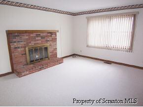 3138 Blue Spruce Road Moscow, PA 18444 - Photo 2 of 6 a view of an empty room with a window
