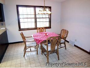 3138 Blue Spruce Road Moscow, PA 18444 - Photo 3 of 6 a dining room with furniture and window