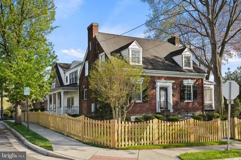 front view of a house with a small yard