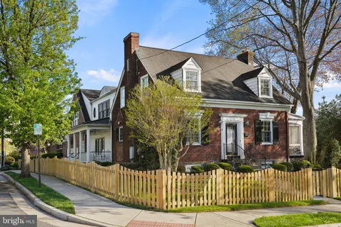 front view of a house with a small yard