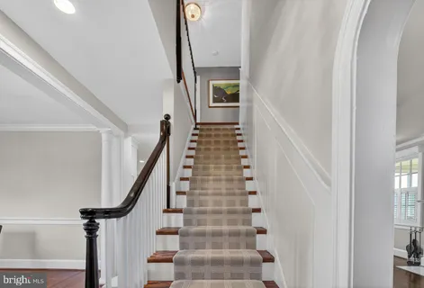 a view of a house with backyard sitting area and garden