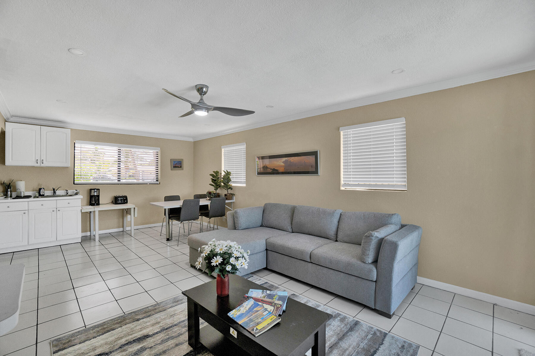 1901 North Riverside Drive, Unit 1 Pompano Beach, FL 33062 - Photo 11 of 26 a living room with furniture and wooden floor