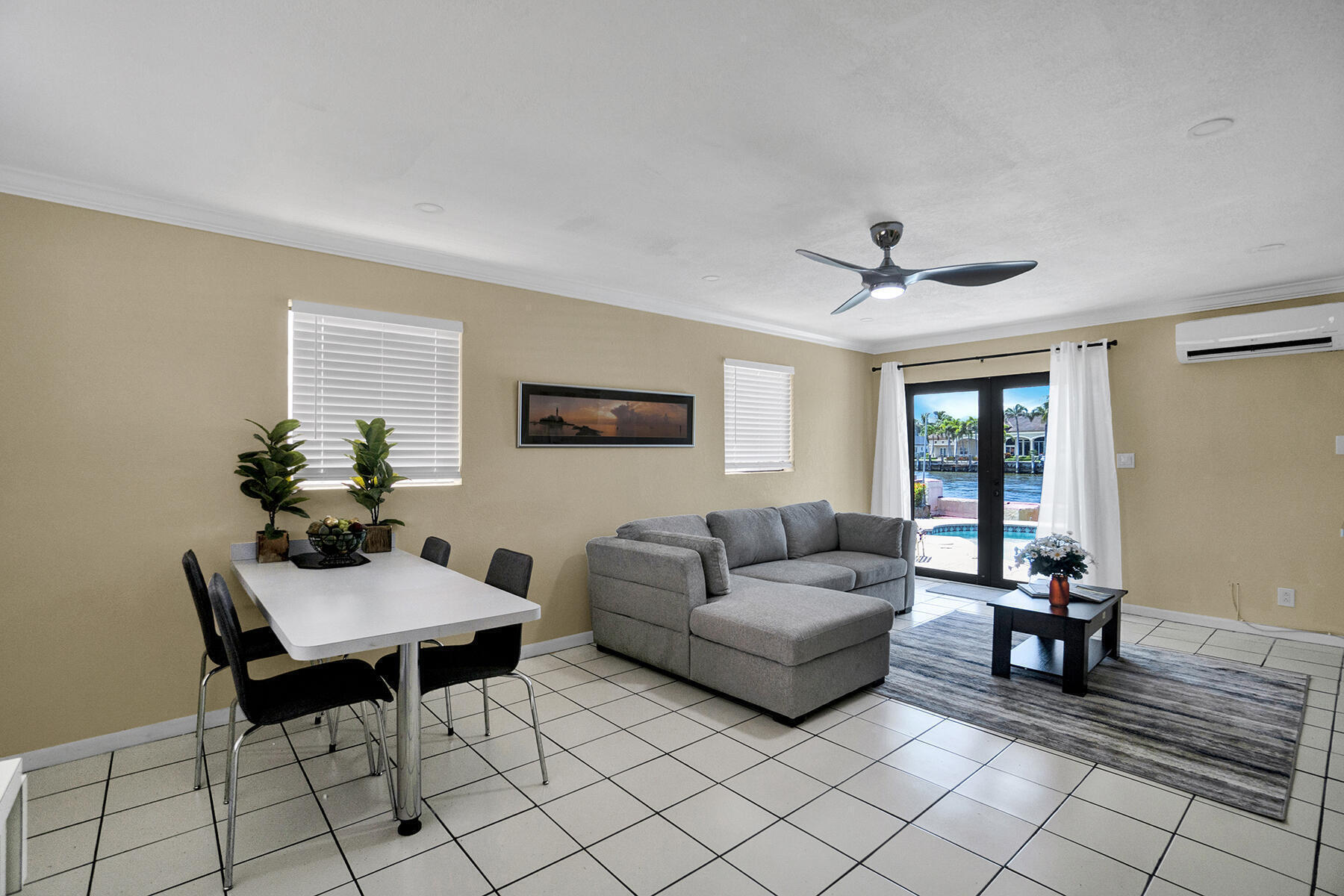 1901 North Riverside Drive, Unit 1 Pompano Beach, FL 33062 - Photo 13 of 26 a living room with furniture and a table