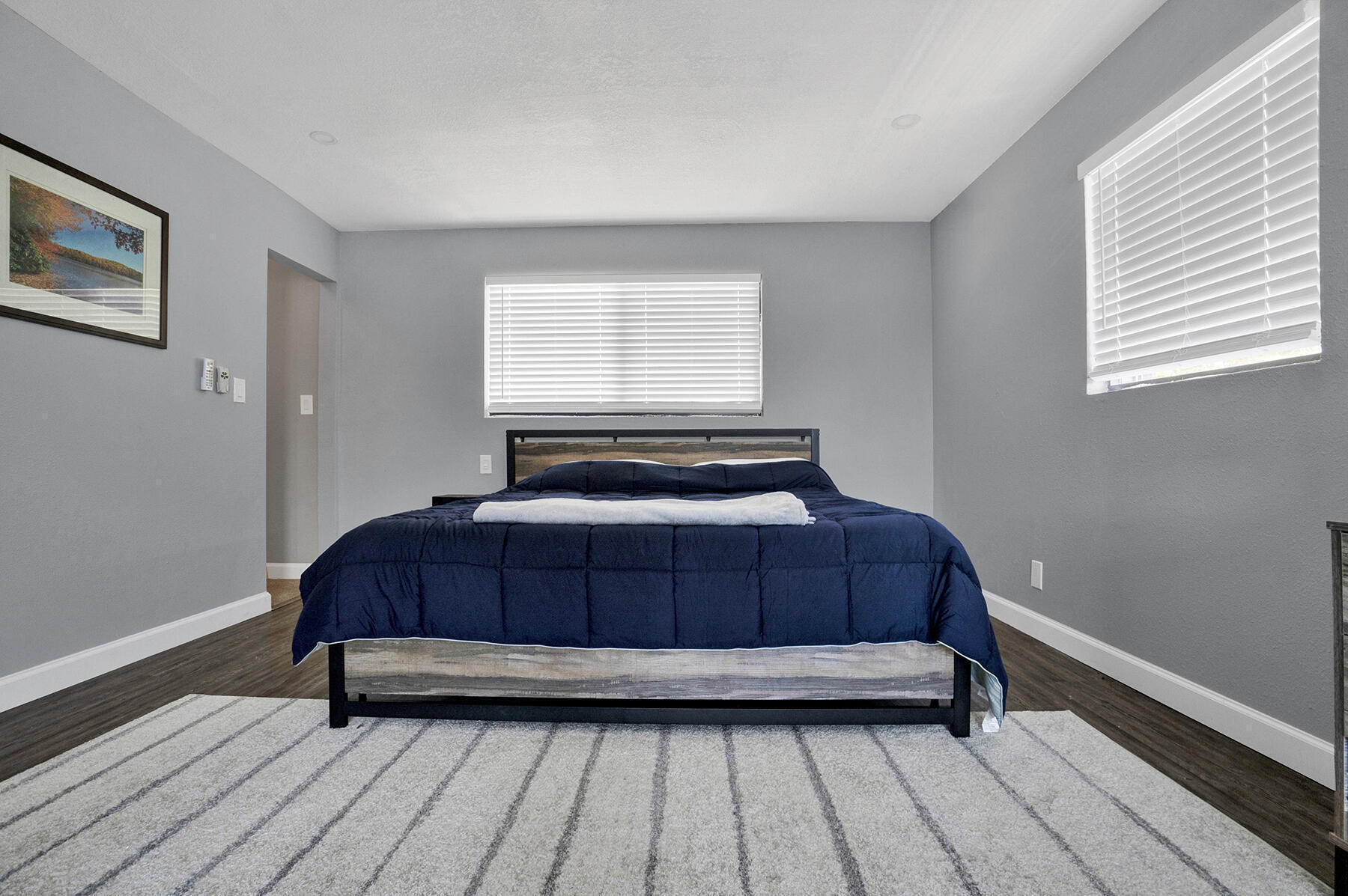 1901 North Riverside Drive, Unit 1 Pompano Beach, FL 33062 - Photo 19 of 26 a bedroom with a bed and window