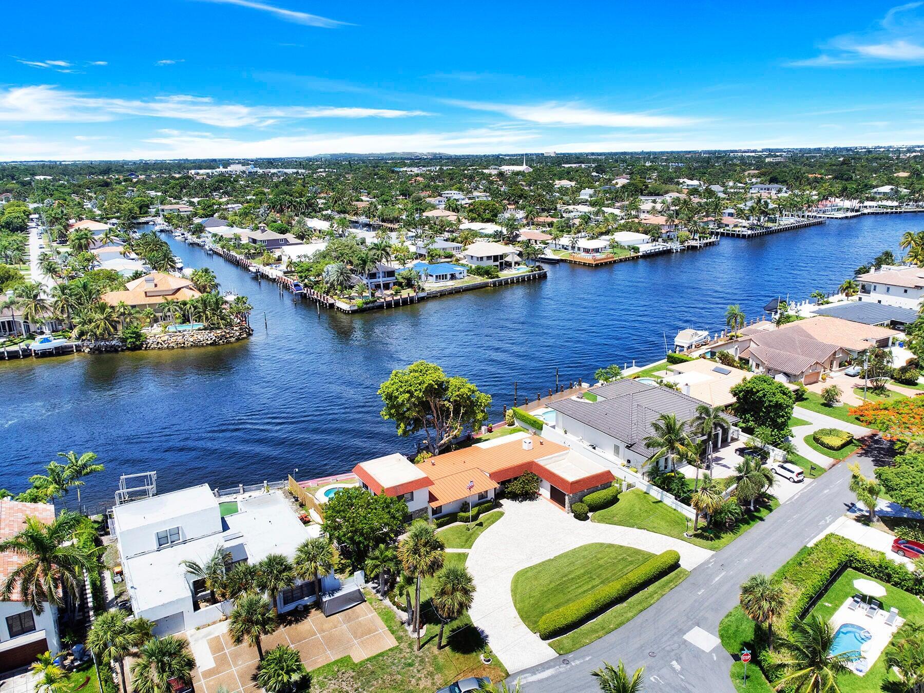 1901 North Riverside Drive, Unit 1 Pompano Beach, FL 33062 - Photo 23 of 26 an aerial view of residential houses with outdoor space