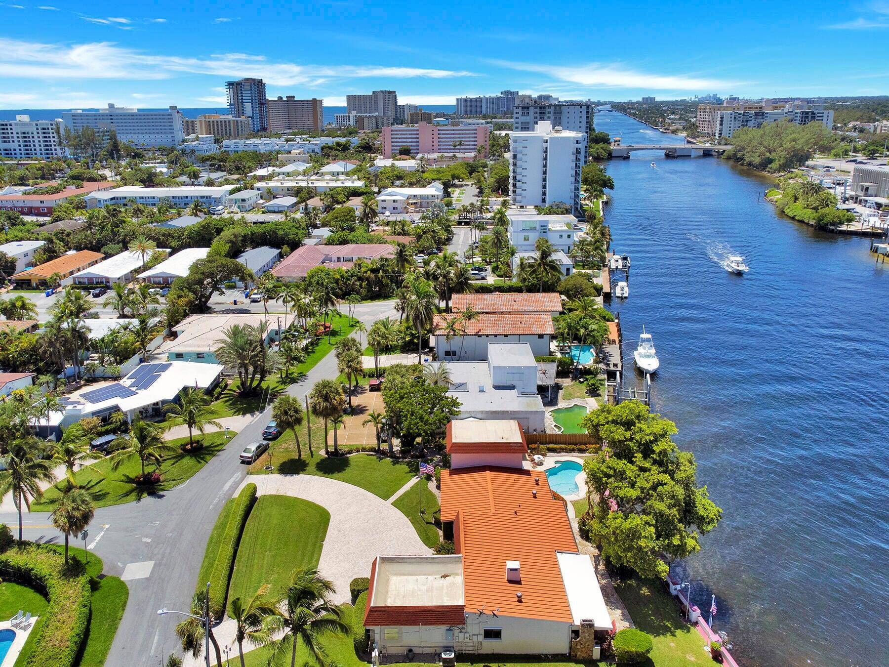 1901 North Riverside Drive, Unit 1 Pompano Beach, FL 33062 - Photo 3 of 26 an aerial view of residential houses with outdoor space and swimming pool