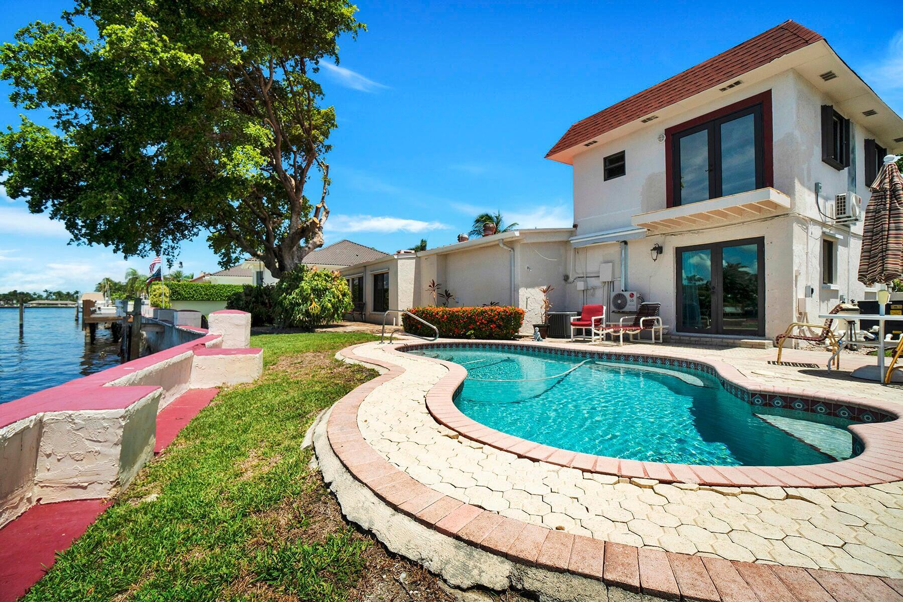1901 North Riverside Drive, Unit 1 Pompano Beach, FL 33062 - Photo 5 of 26 a view of outdoor space yard swimming pool and patio