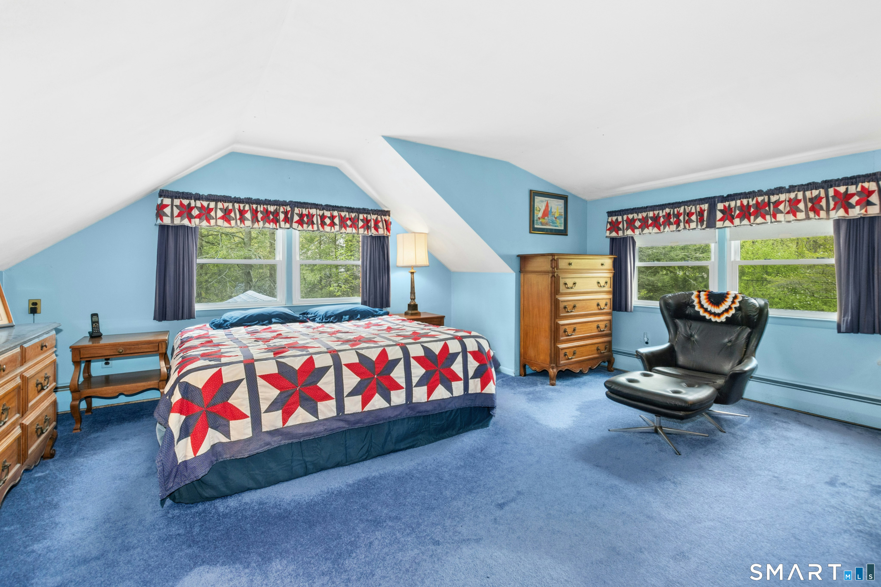 15 Limestone Terrace Ridgefield, CT 06877 - Photo 13 of 32 a bedroom with a bed and window