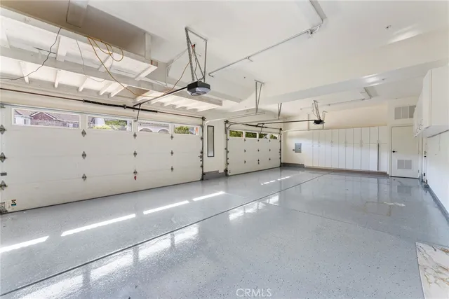 a view of a livingroom with furniture and stairs