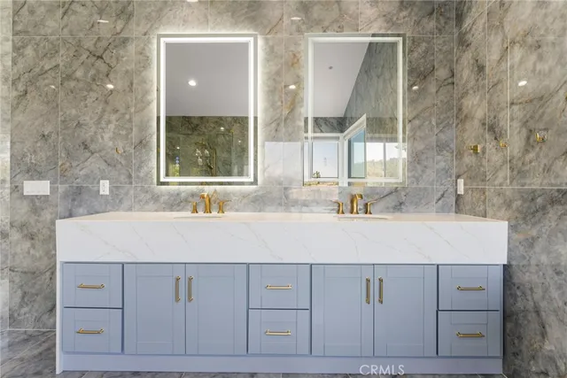 a view of a room with furniture and city view